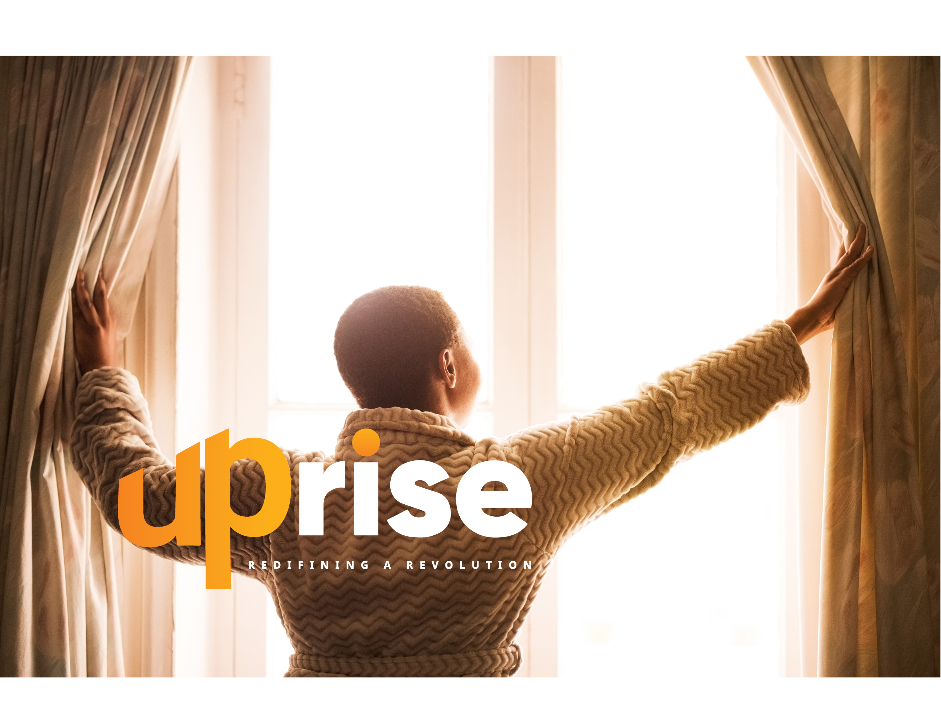 woman opening up her curtains with a lot of light coming through the window